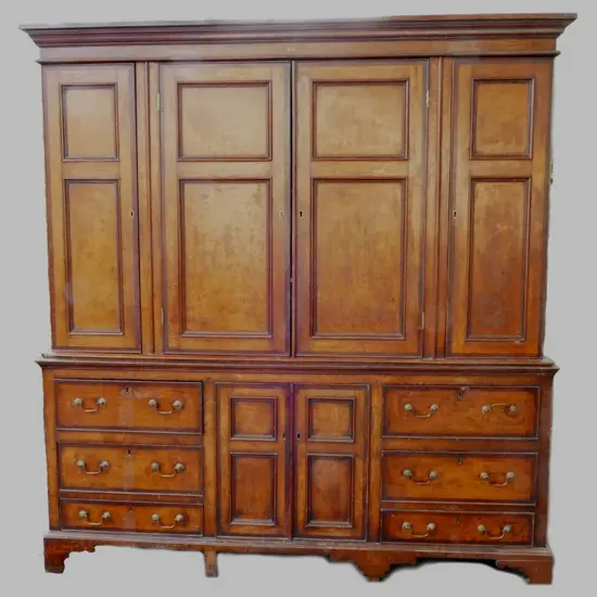 An impressive Georgian oak two-stage housekeeper's cupboard of plain country style