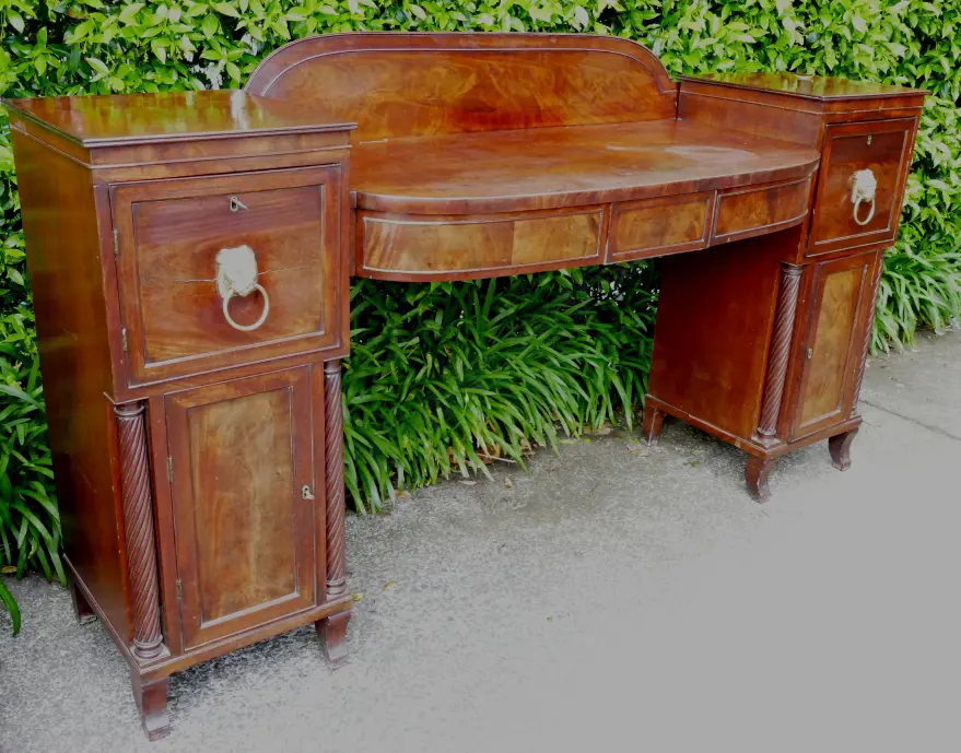 A Regency mahogany bowfront pedestal sideboard Image 1++
