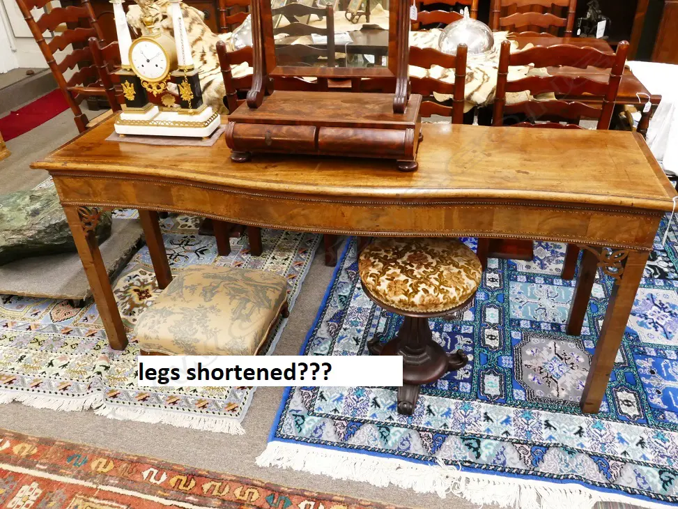 A Georgian walnut serpentine side table with cross banding and herringbone stringing Image 1++