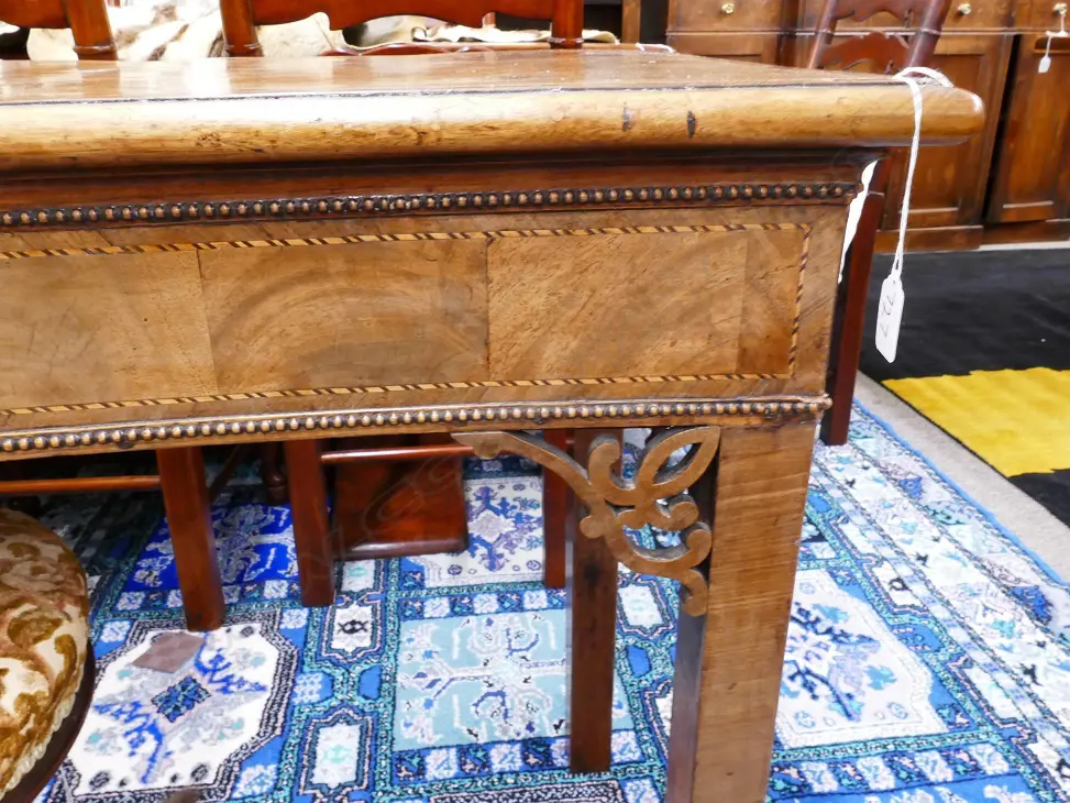 A Georgian walnut serpentine side table with cross banding and herringbone stringing Image 1++