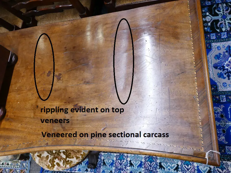 A Georgian walnut serpentine side table with cross banding and herringbone stringing Image 1++