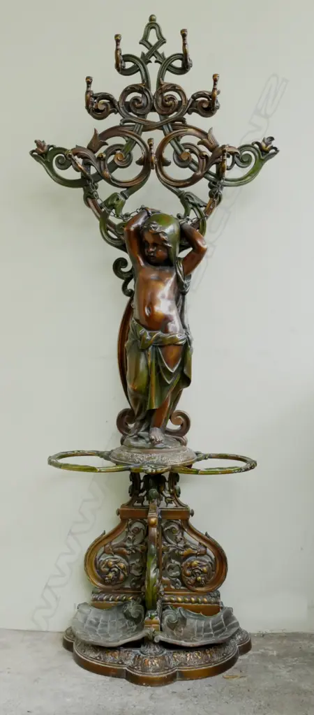 A large ornate cast iron hall stand with green and gold patina of French style Image 1++