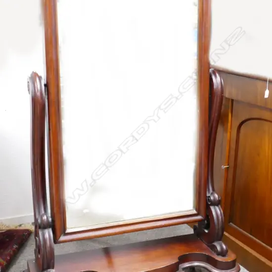 A Victorian mahogany cheval mirror