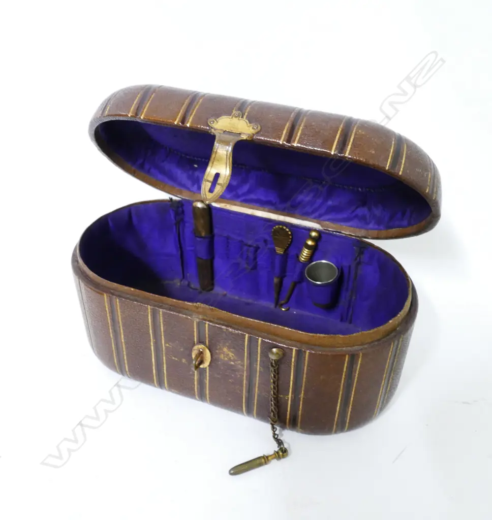 A small Victorian brown leather sewing box Image 1++