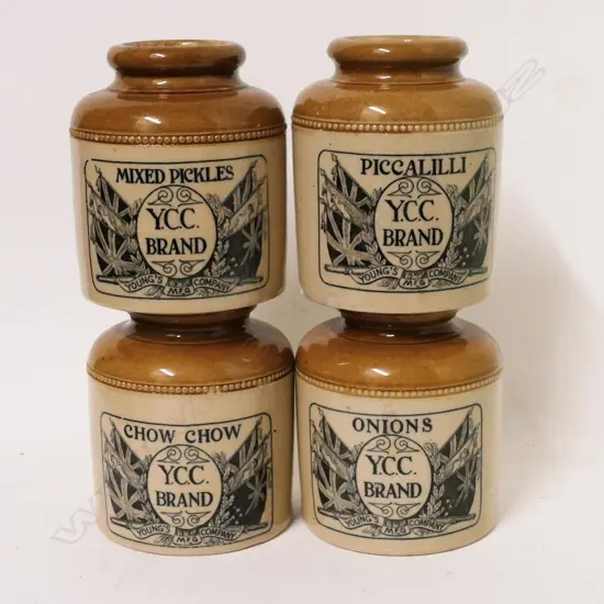 A set of YCC stoneware condiment jars