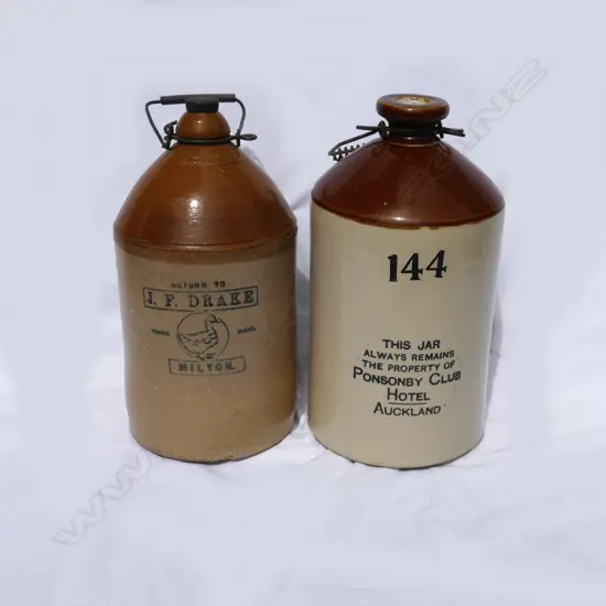 Two early stone crocks