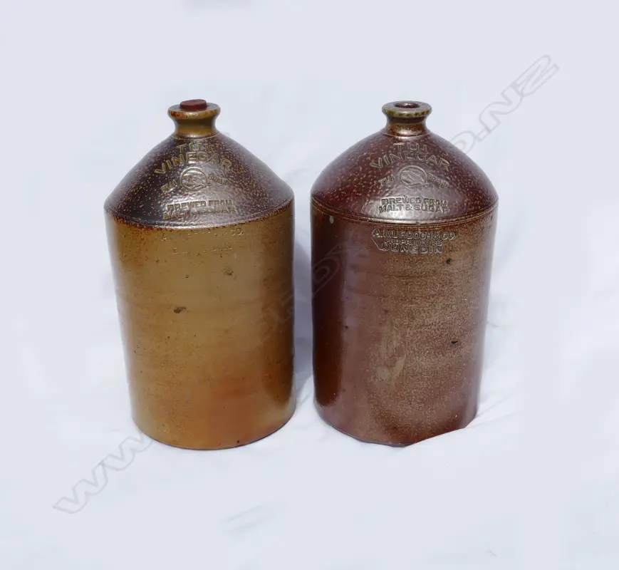 Two early salt glaze Tui vinegar crocks Image 1++
