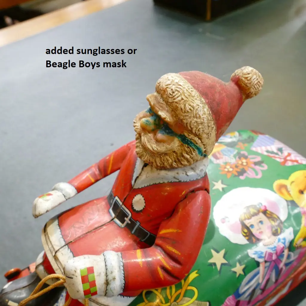 A vintage Japanese tin plate Santa on Sleigh battery toy Image 1++