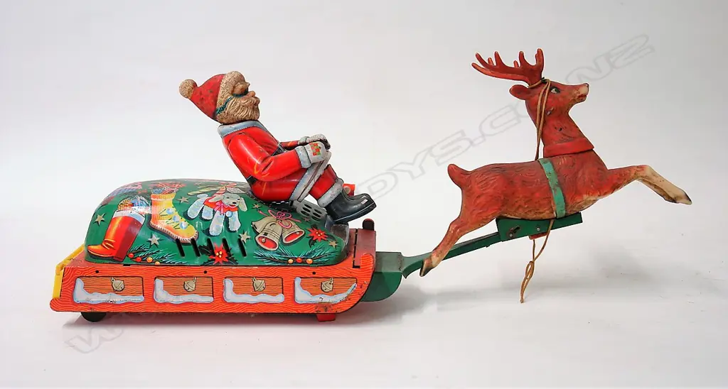 A vintage Japanese tin plate Santa on Sleigh battery toy Image 1++