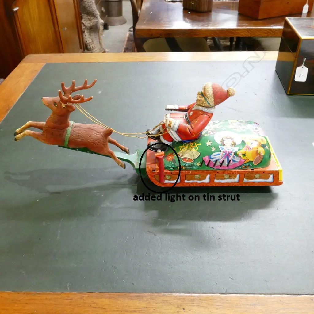 A vintage Japanese tin plate Santa on Sleigh battery toy Image 1++