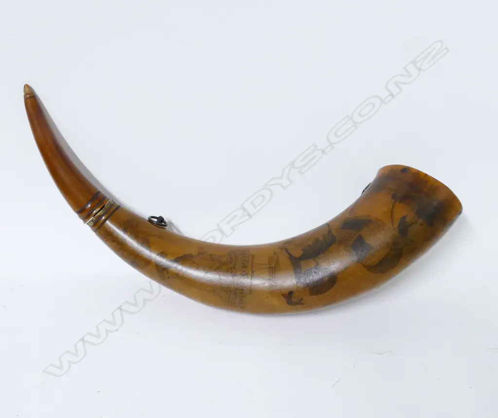 A 19thC scrimshaw powder horn Image 1++