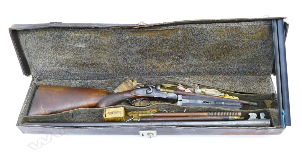A 12g double barrel shotgun Image 1++