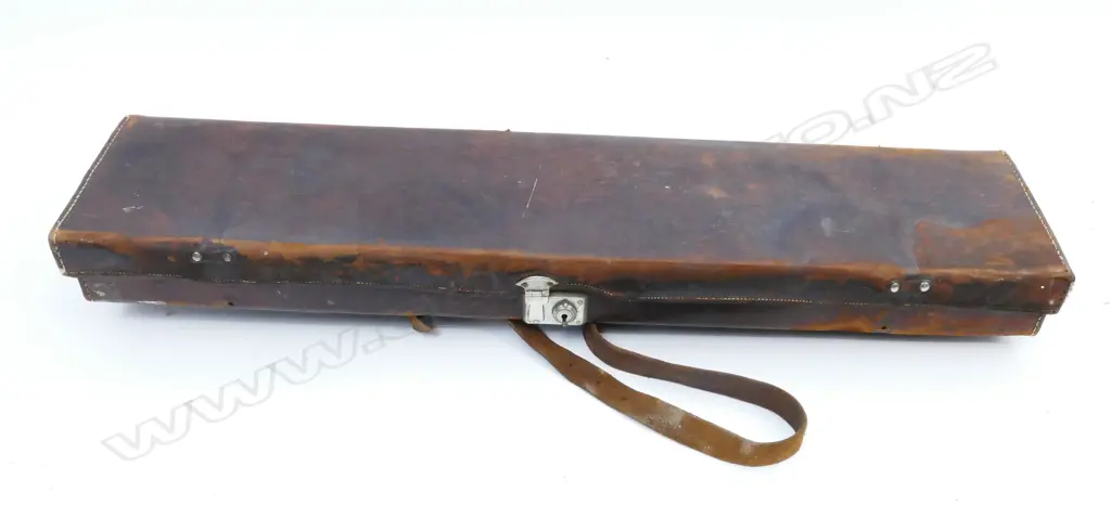 A 12g double barrel shotgun Image 1++