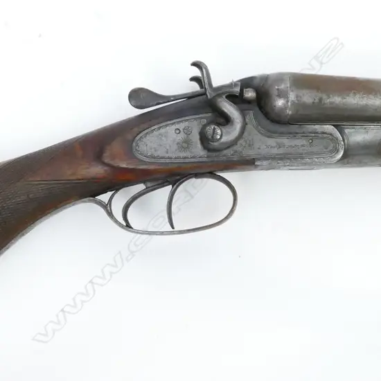 A 12g double barrel shotgun