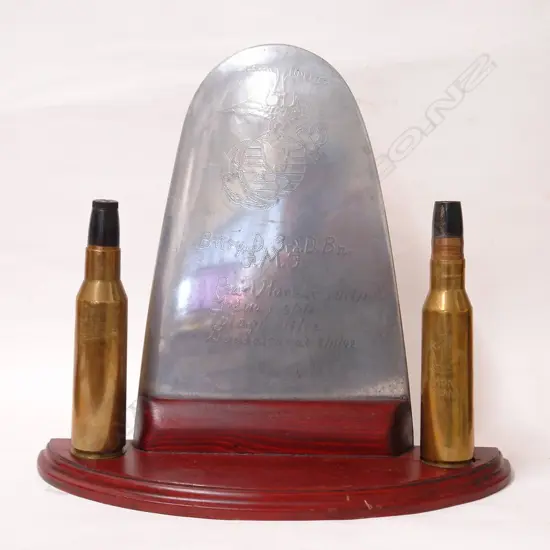 A WWII American trench wing tip and projectile display