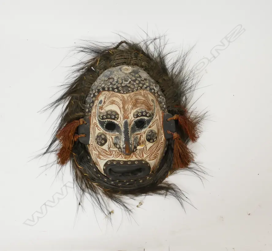 A Papua New Guinea tribal mask with pigment decoration Image 1++