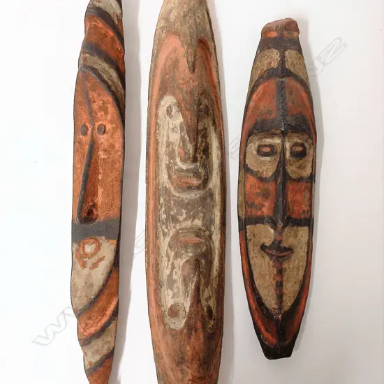 Three old Papua New Guinea mask type carvings
