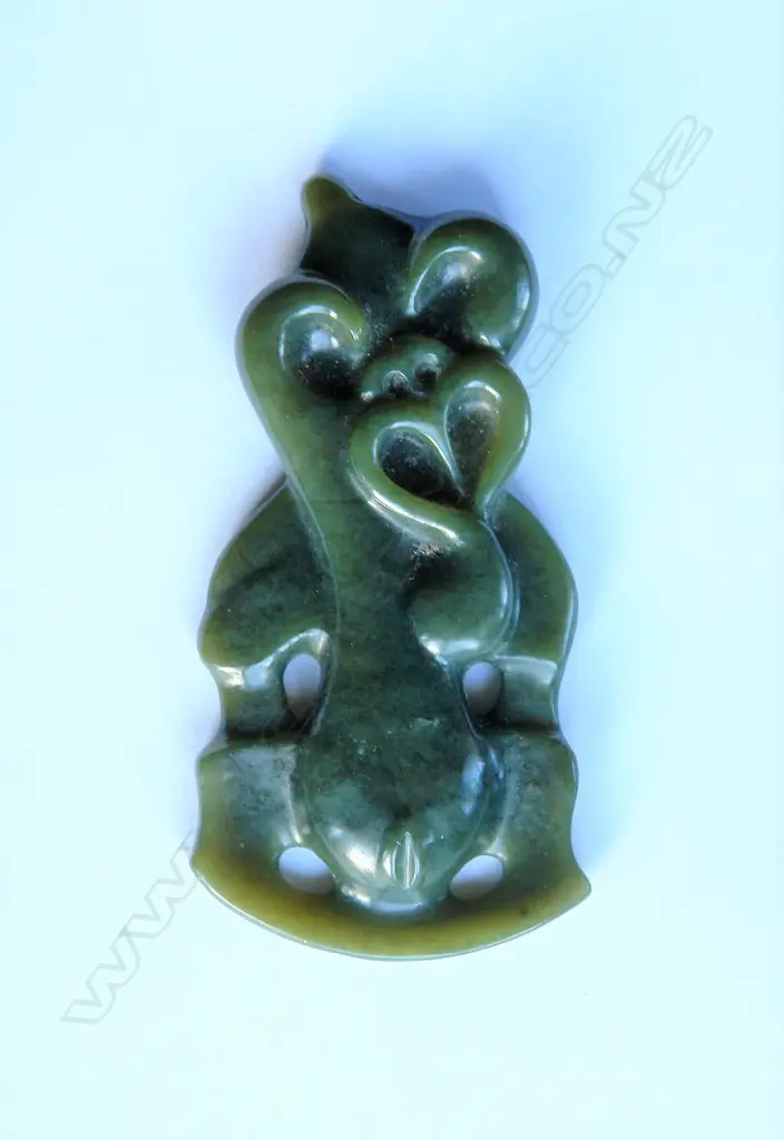 A pounamu hei tiki pendant Image 1++