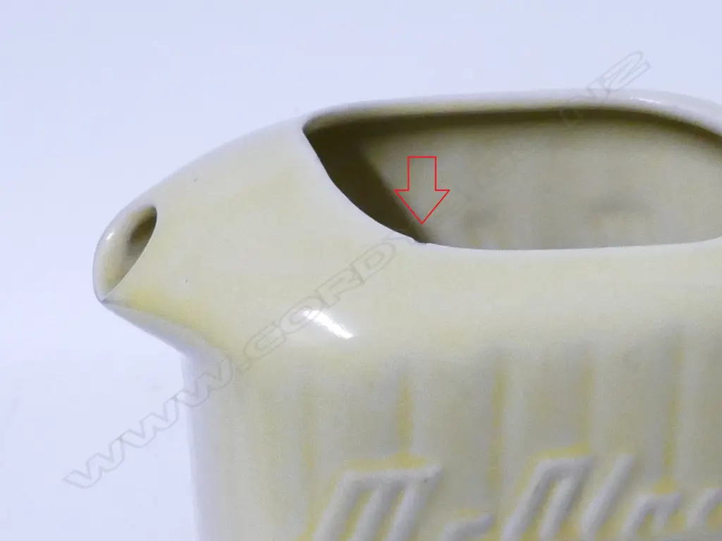 A vintage Crown Lynn yellow glazed McAlpine refrigerator jug Image 1++