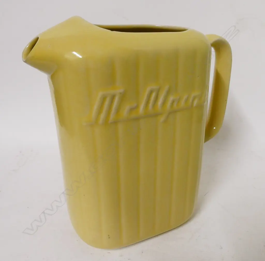 A vintage Crown Lynn yellow glazed McAlpine refrigerator jug Image 1++