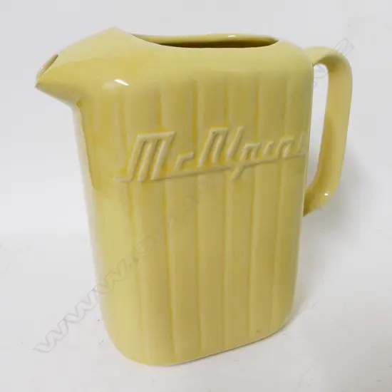 A vintage Crown Lynn white glazed McAlpine refrigerator jug