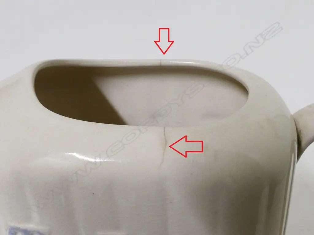 A vintage Crown Lynn green glazed McAlpine refrigerator jug Image 1++