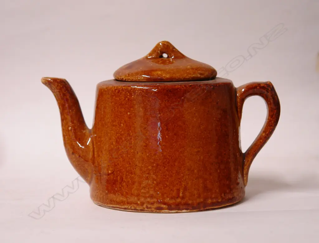 A Luke Adams brown glazed teapot Image 1++