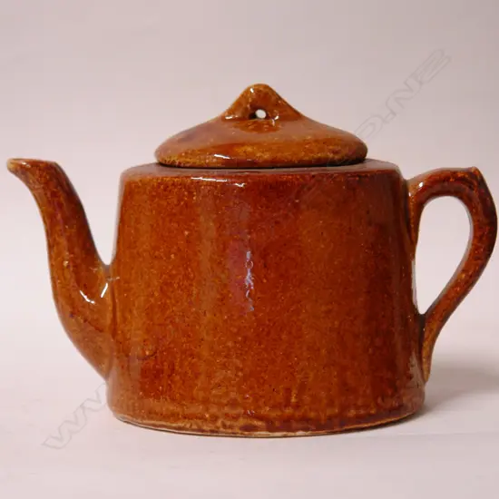 A Luke Adams brown glazed teapot
