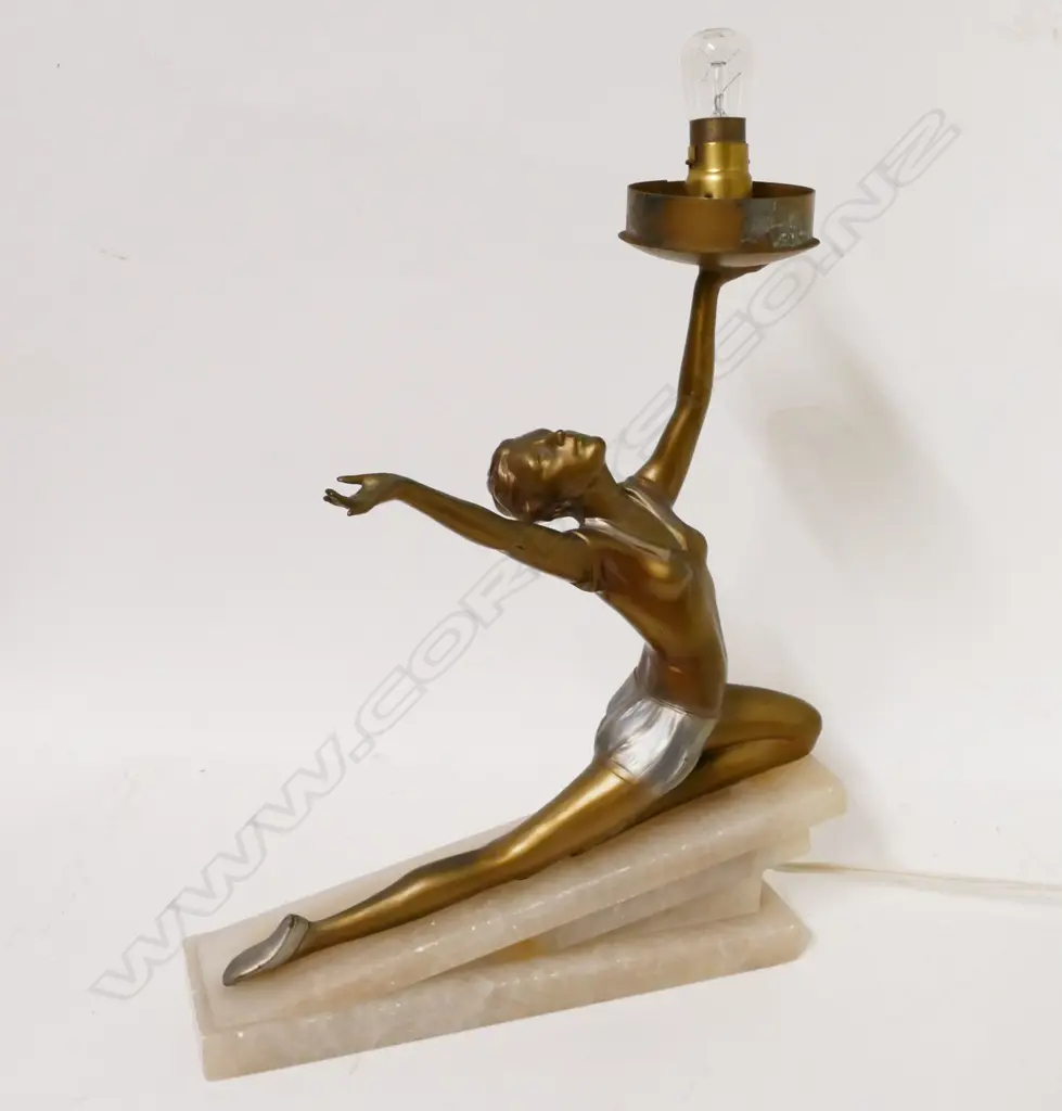 An Art Deco figured table lamp Image 1++