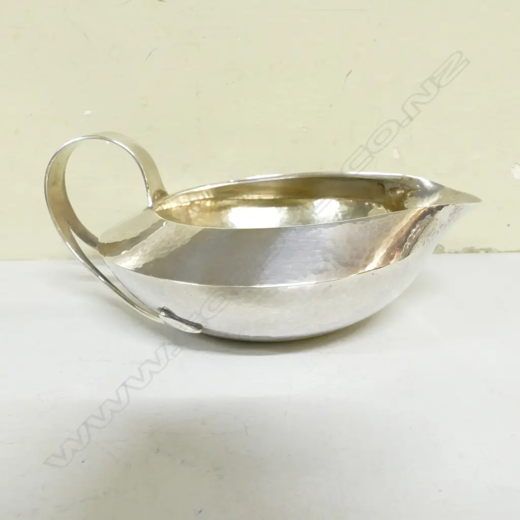 A rare Liberty & Co. Cymric silver four-piece tea service Image 1++