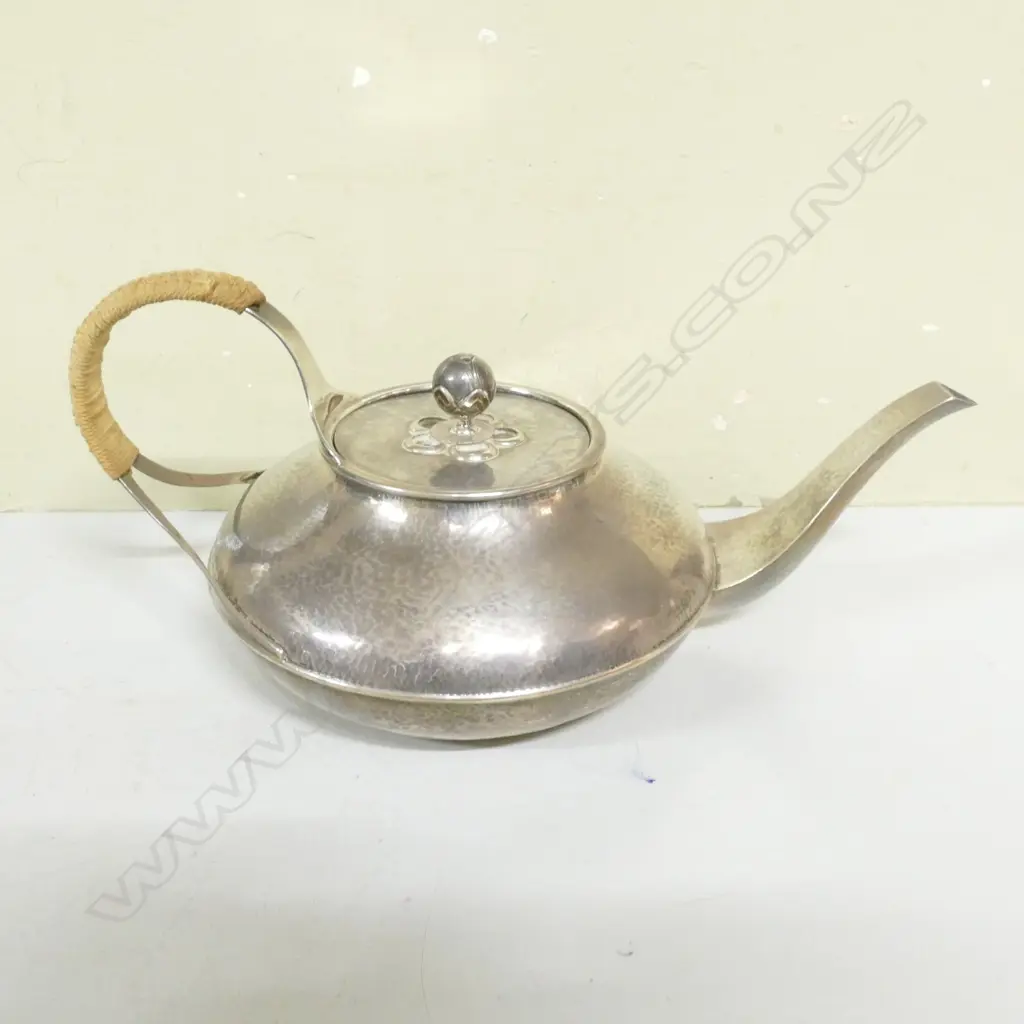 A rare Liberty & Co. Cymric silver four-piece tea service Image 1++