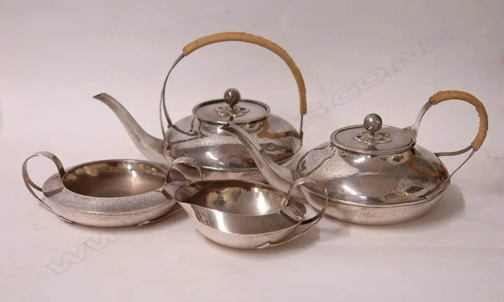 A rare Liberty & Co. Cymric silver four-piece tea service Image 1++