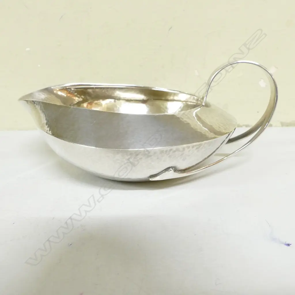 A rare Liberty & Co. Cymric silver four-piece tea service Image 1++