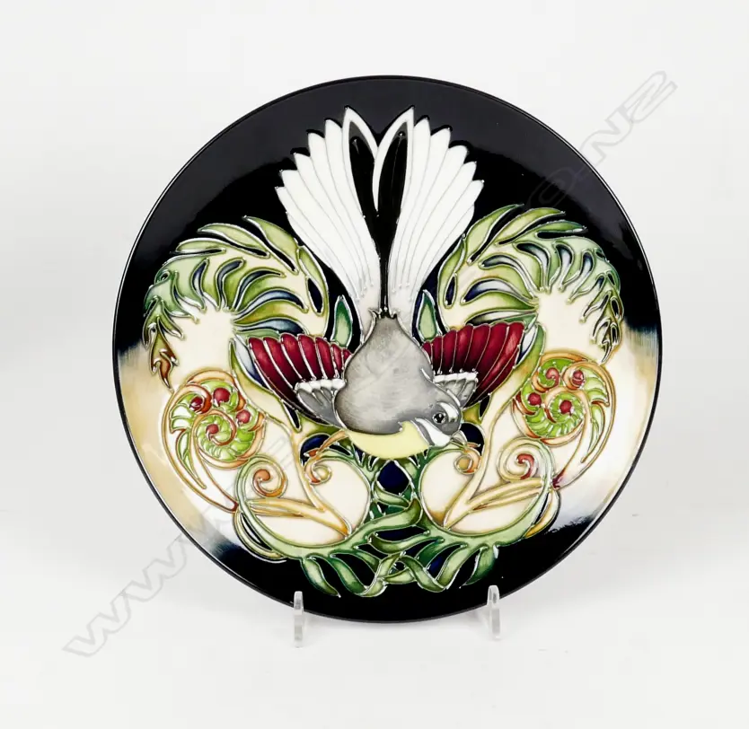 A Moorcroft plate decorated with a fantail Image 1++