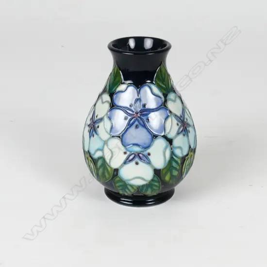 A Moorcroft 'Tudor Rose Blue' vase. Special edition