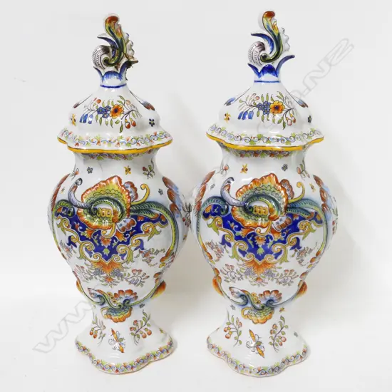 A pair old tin glazed lidded urns