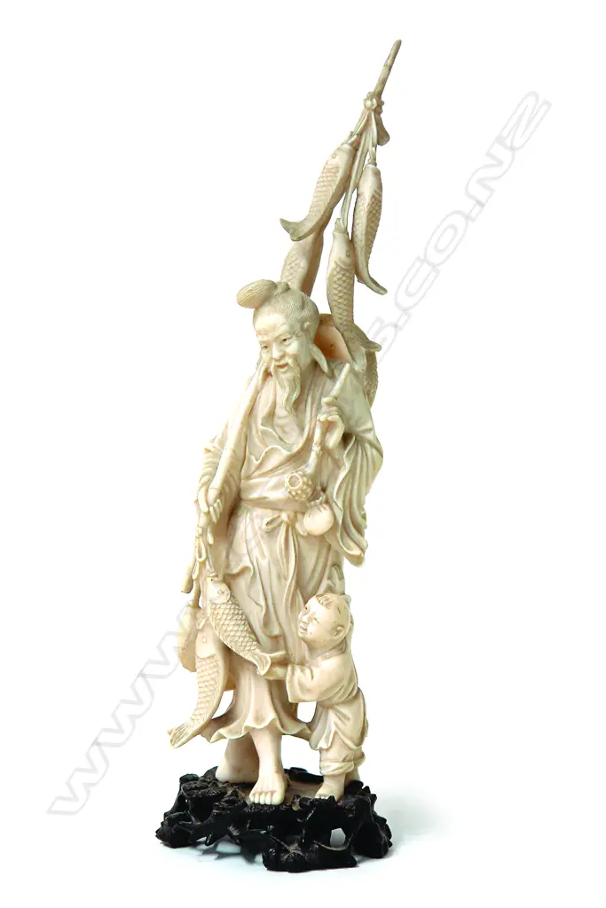 An old Chinese carved ivory figure of a fisherman Image 1++
