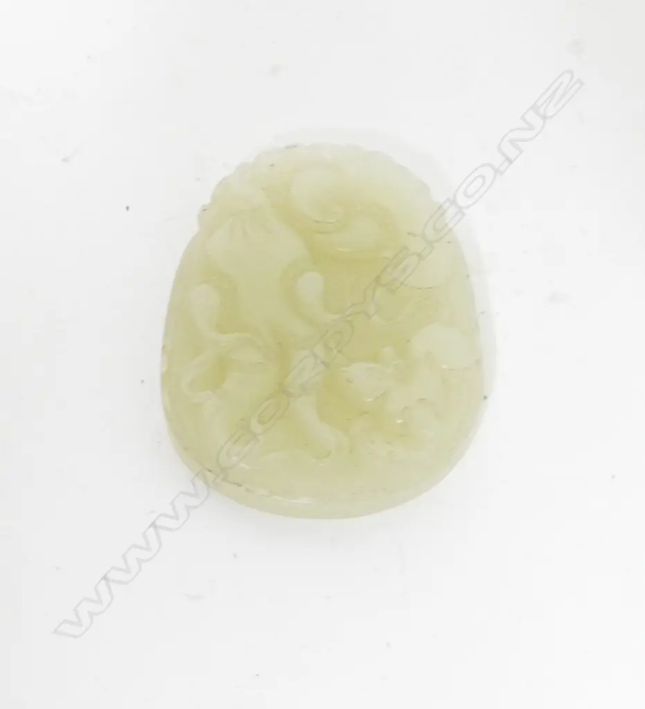 A carved Chinese jade pendant carving Image 1++