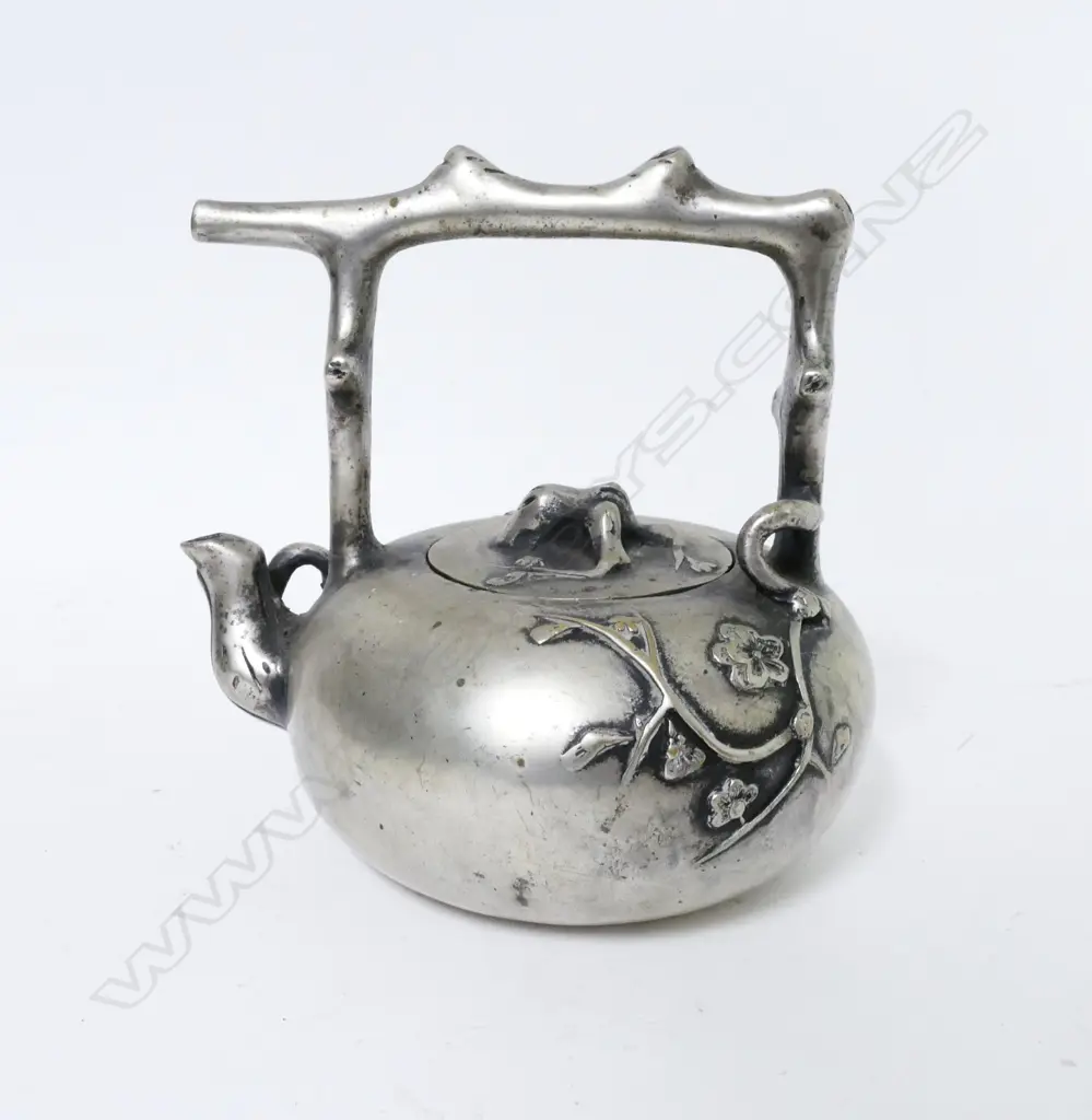 A Chinese white metal teapot Image 1++