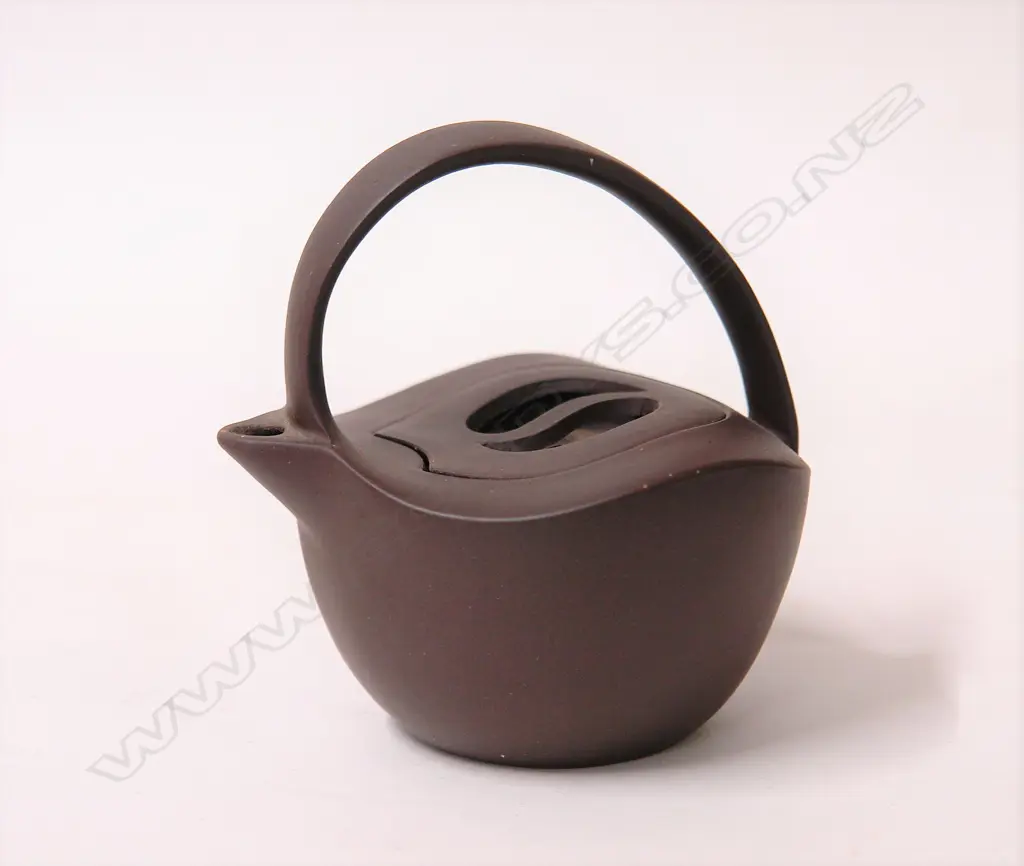 A vintage Yixing ware teapot Image 1++