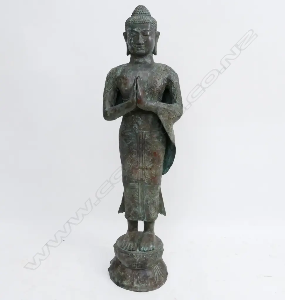 A large Eastern bronze Buddha figure Image 1++