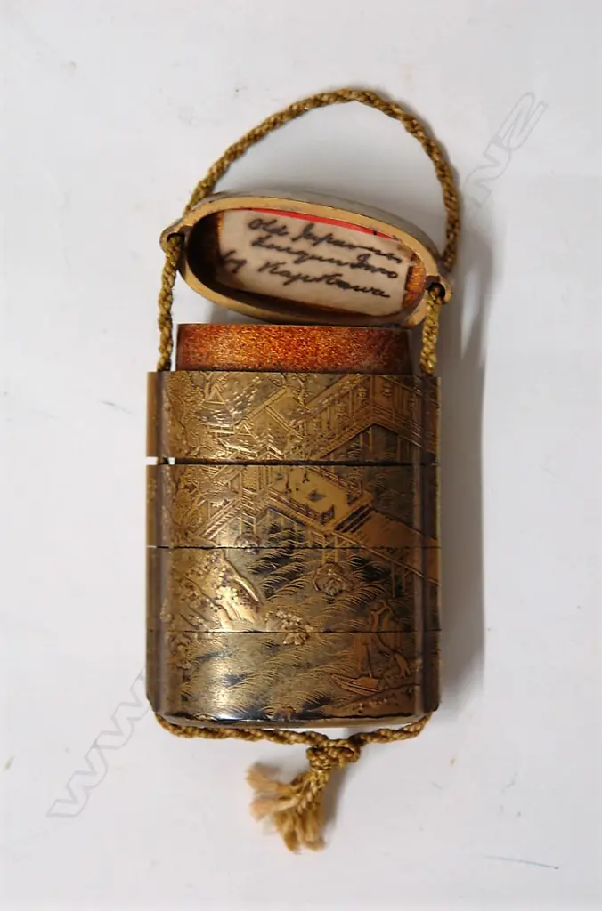 An old Japanese five-section black lacquered and gilded inro Image 1++