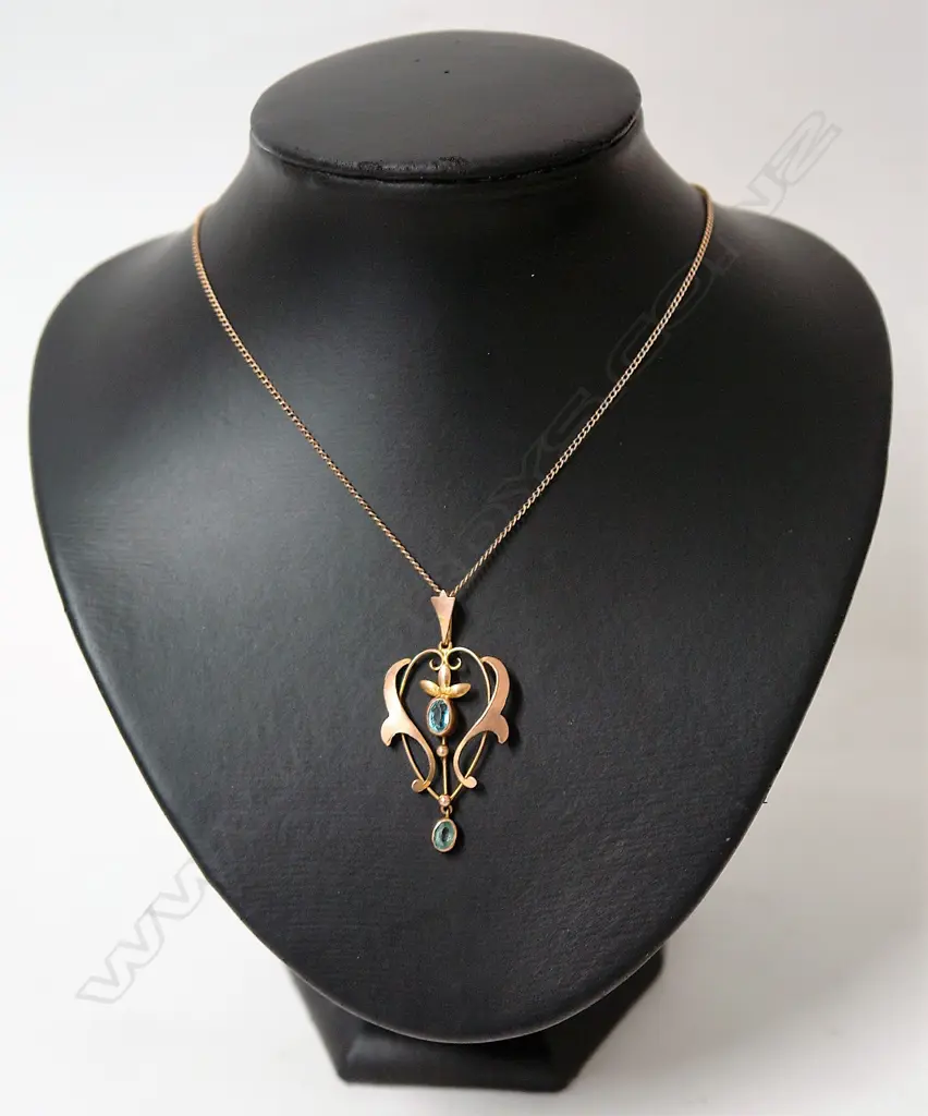 An Edwardian Art Nouveau 9ct. rose gold and blue topaz pendant Image 1++