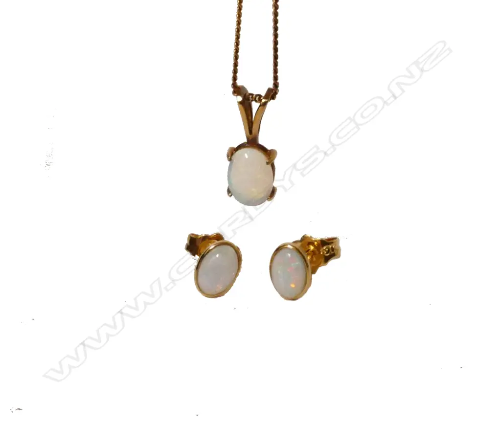 A 9ct. gold opal earrings and pendant suite Image 1++