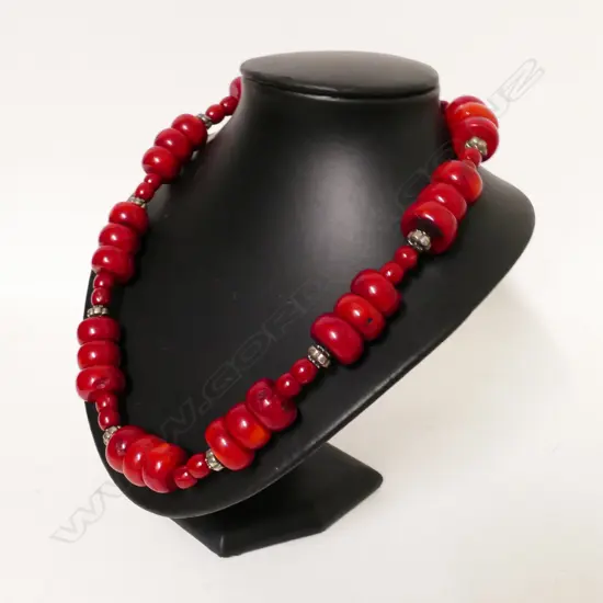 A vintage coral and silver necklace