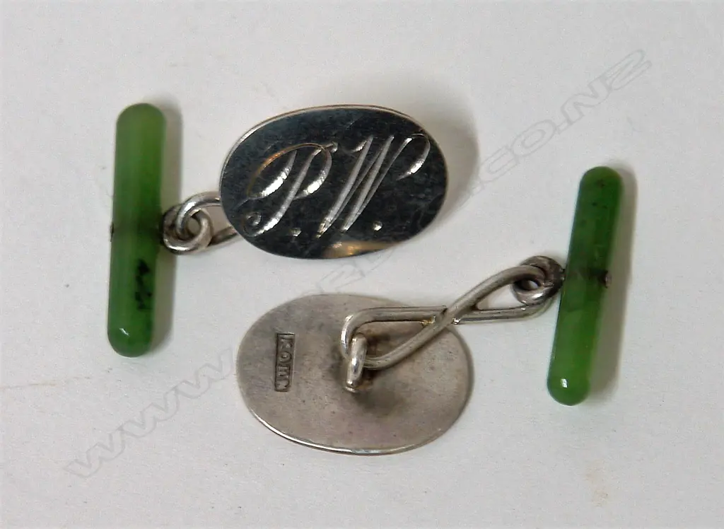 A pair of early 20thC N.Z. silver and greenstone cufflinks by A. Kohn Image 1++