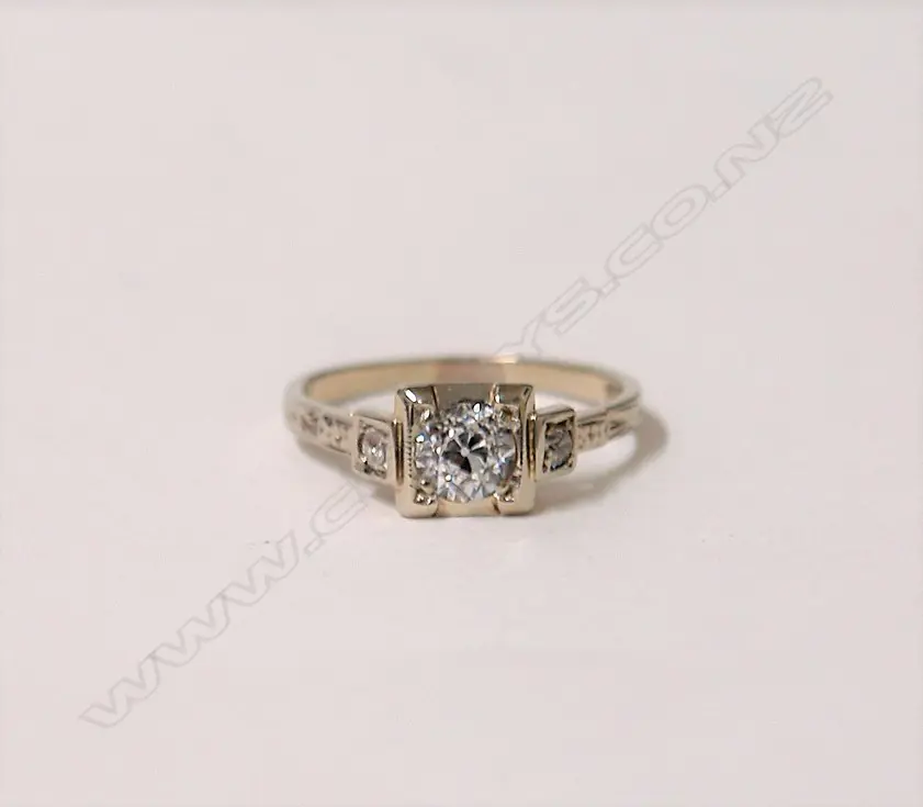 A lady's estate 18ct. white gold and diamond solitaire ring Image 1++