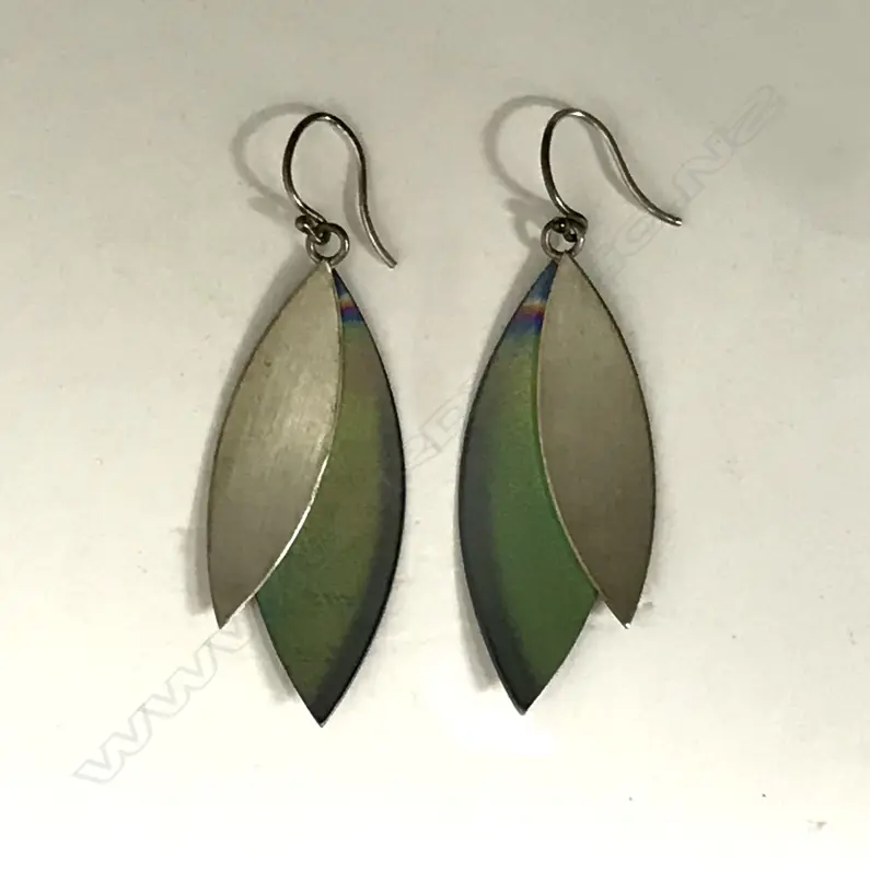 A vintage pair of Nick Charlton titanium earrings Image 1++