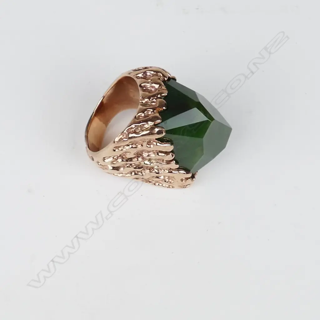 A large and impressive 9ct. rose gold and pounamu gent's ring Image 1++