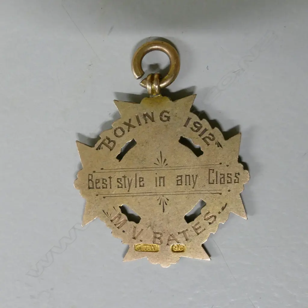 A 9ct. gold Wellington Boys College boxing medallion Image 1++